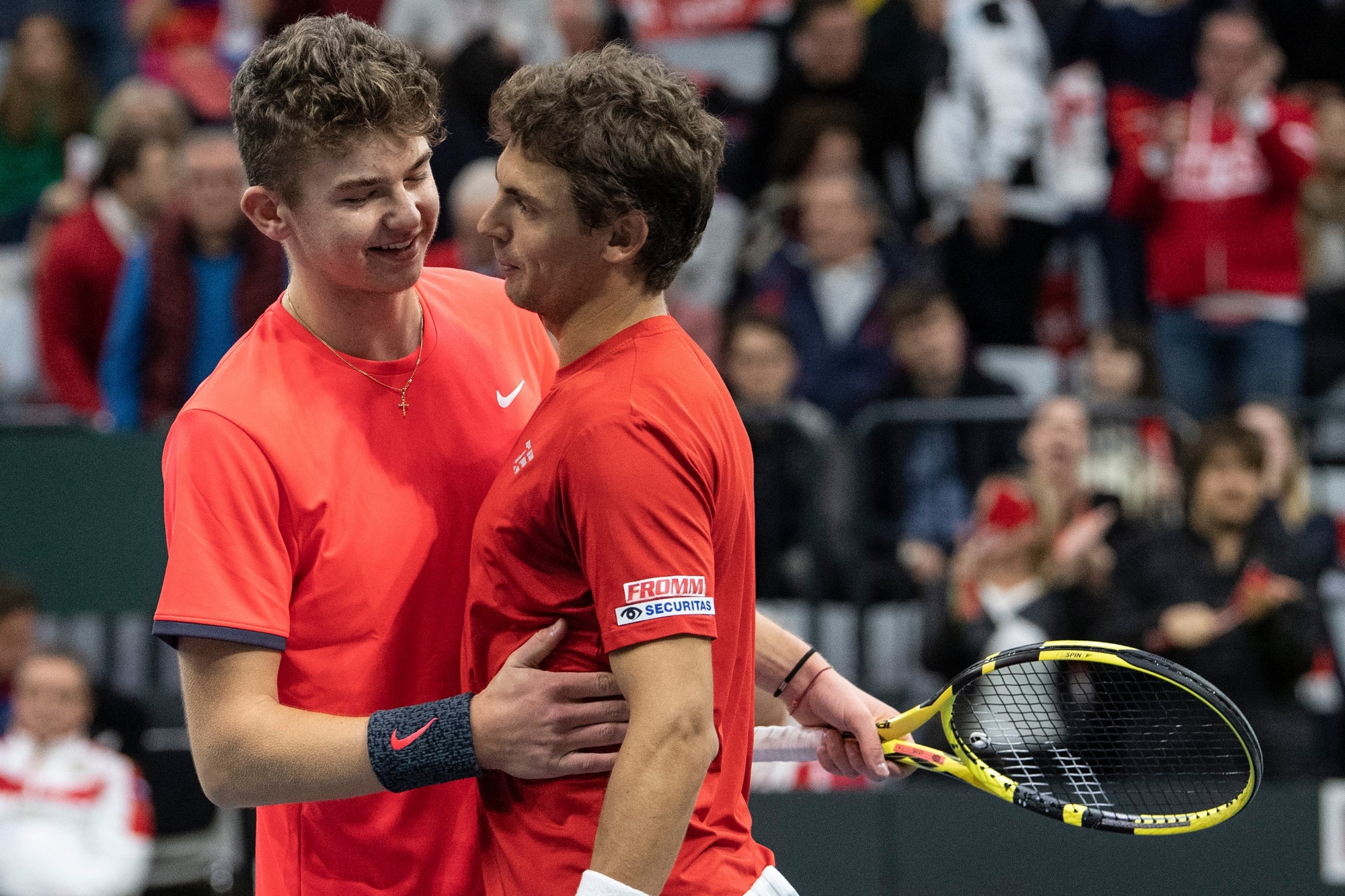 Switzerland's Henri Laaksonen, right, and Jerome Kym celebrate their victory after winning against Russia's Evgeny Donskoy, and Andrey Rublev during the double match of the Davis Cup qualification final round between Switzerland and Russia at the Swiss Tennis Arena in Biel, Switzerland, on Saturday, February 2, 2019. (KEYSTONE/Peter Schneider) SWITZERLAND TENNIS DAVIS CUP