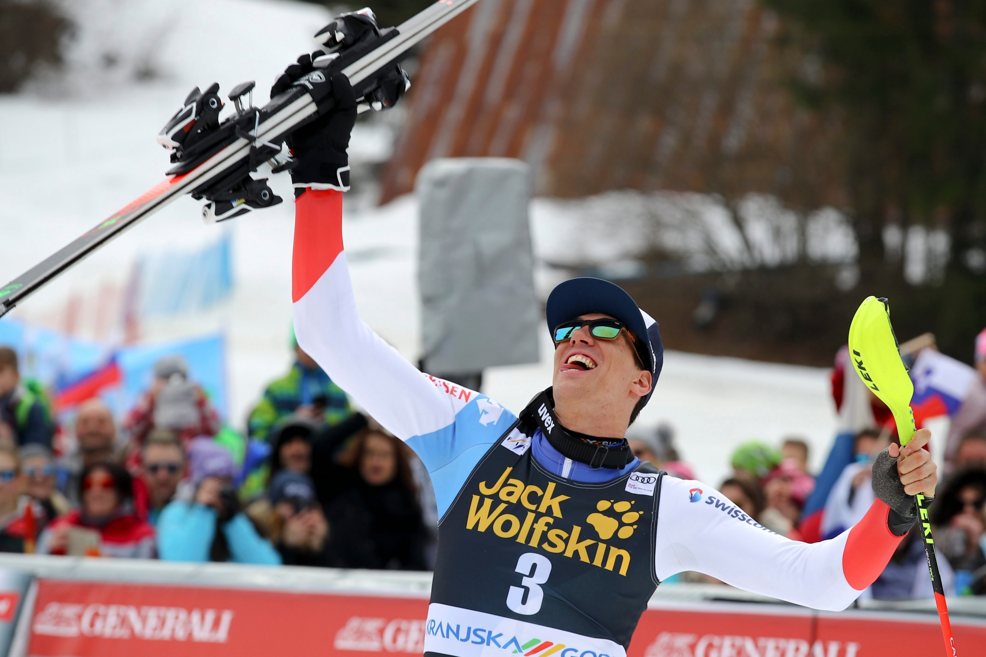 Switzerland's Ramon Zenhaeusern celebrates after winning an Alpine Skiing World Cup men's slalom, in Kranjska Gora, Slovenia, Sunday, March. 10, 2019. (AP Photo/Marco Trovati) Slovenia Alpine Skiing World Cup