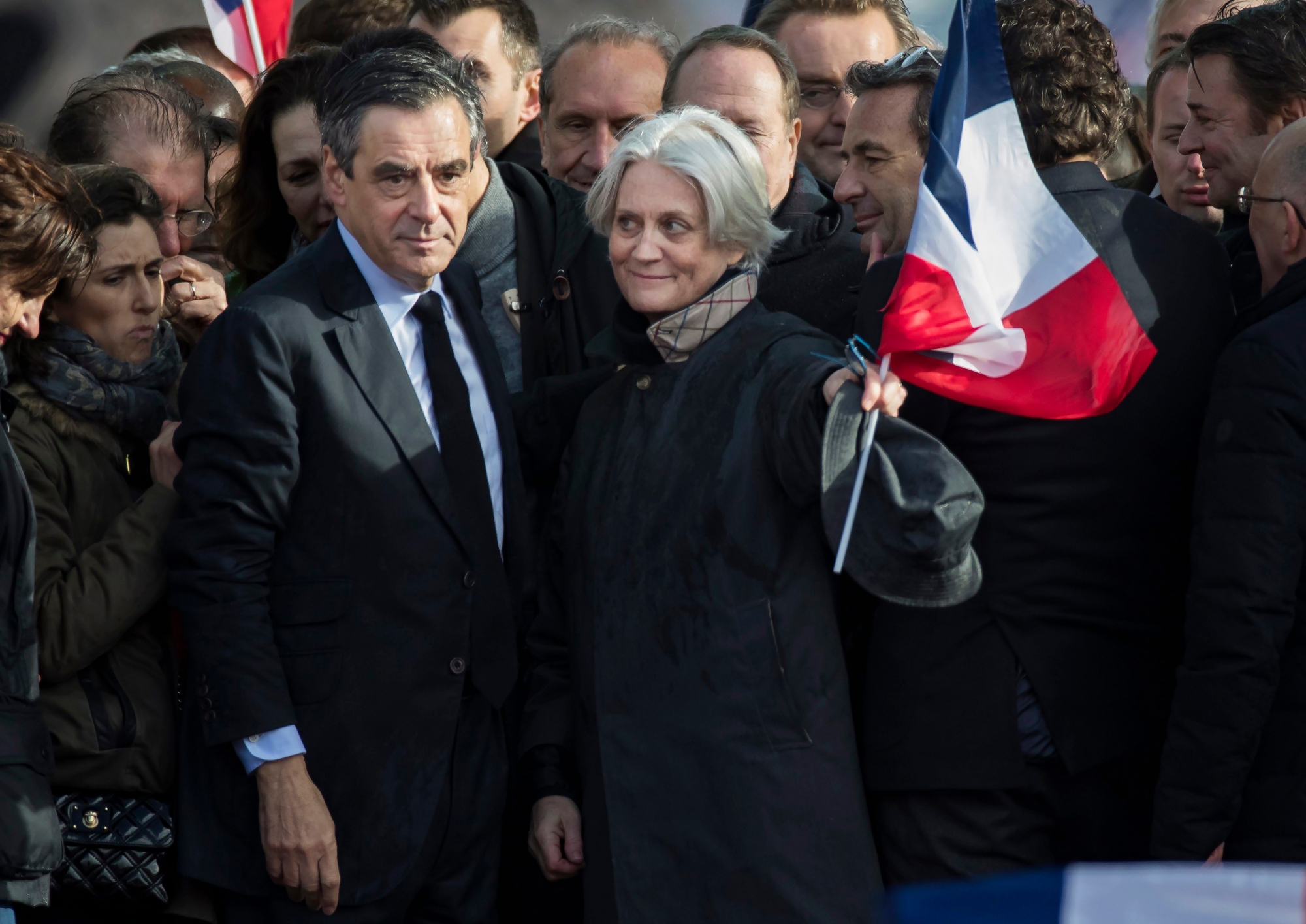 epa07522651 (FILE) 'Les Republicains' party candidate for the 2017 French presidential elections, Francois Fillon (L) flanked by his wife Penelope (R) during a meeting organized to support him on the Place du Trocadero in Paris, France, 05 March 2017 (reissued 23 April 2019). According to media reports, Fillon is to face trial against over alleged misuse of public money. Fillon is accused of paying his wife as a co-worker, without her having worked for it.  EPA/IAN LANGSDON (FILE) FRANCE FILLON TRIAL