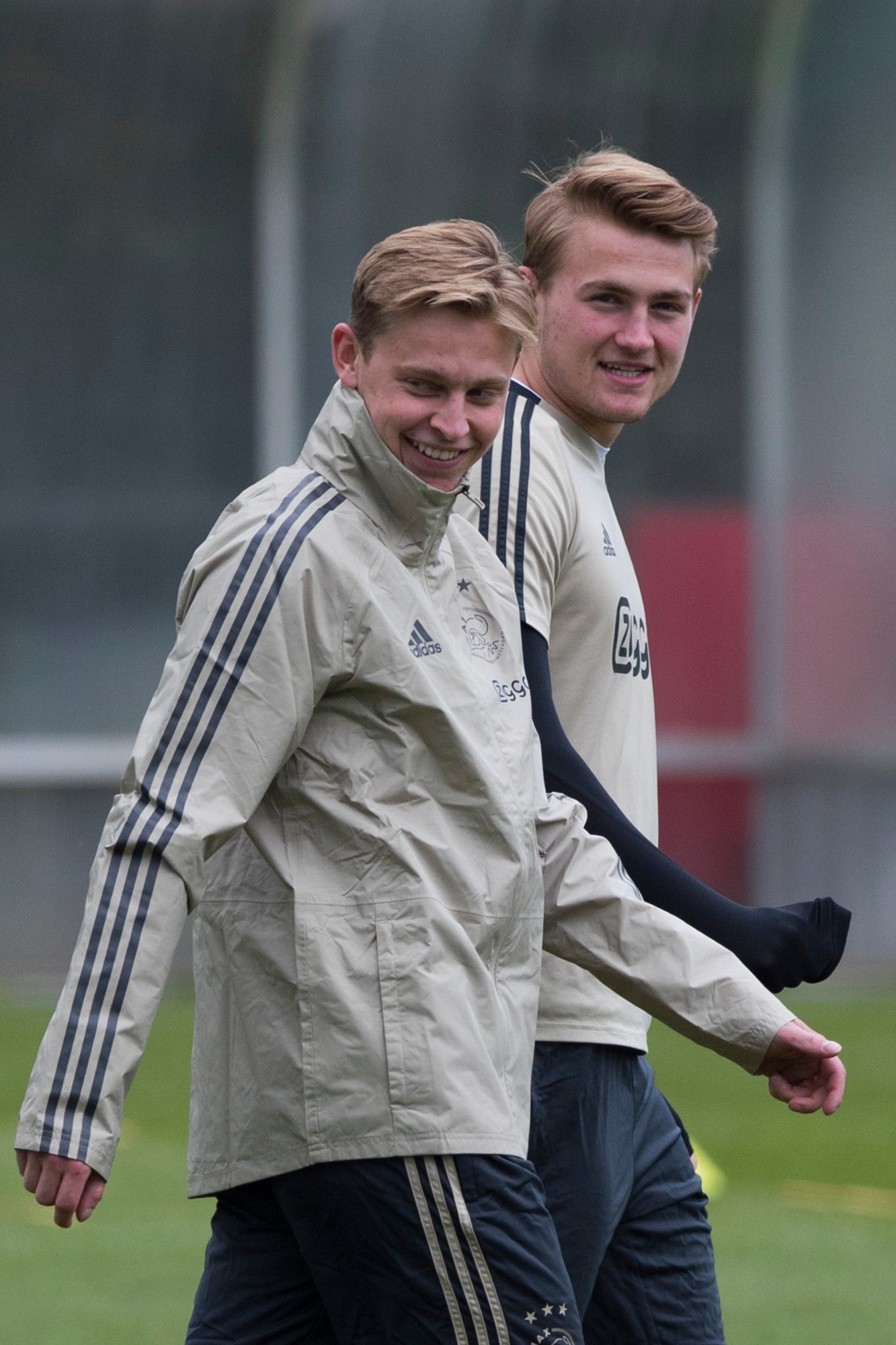 Ajax's Matthijs de Ligt, right, and Ajax's Frenkie de Jong talk during a training near the Johan Cruyff Arena in Amsterdam, Netherlands, Tuesday, May 7, 2019. Ajax will play Tottenham Hotspur in the Champions League semifinal, second leg, soccer match on Wednesday May 8, 2019. (AP Photo/) Netherlands Soccer Champions League