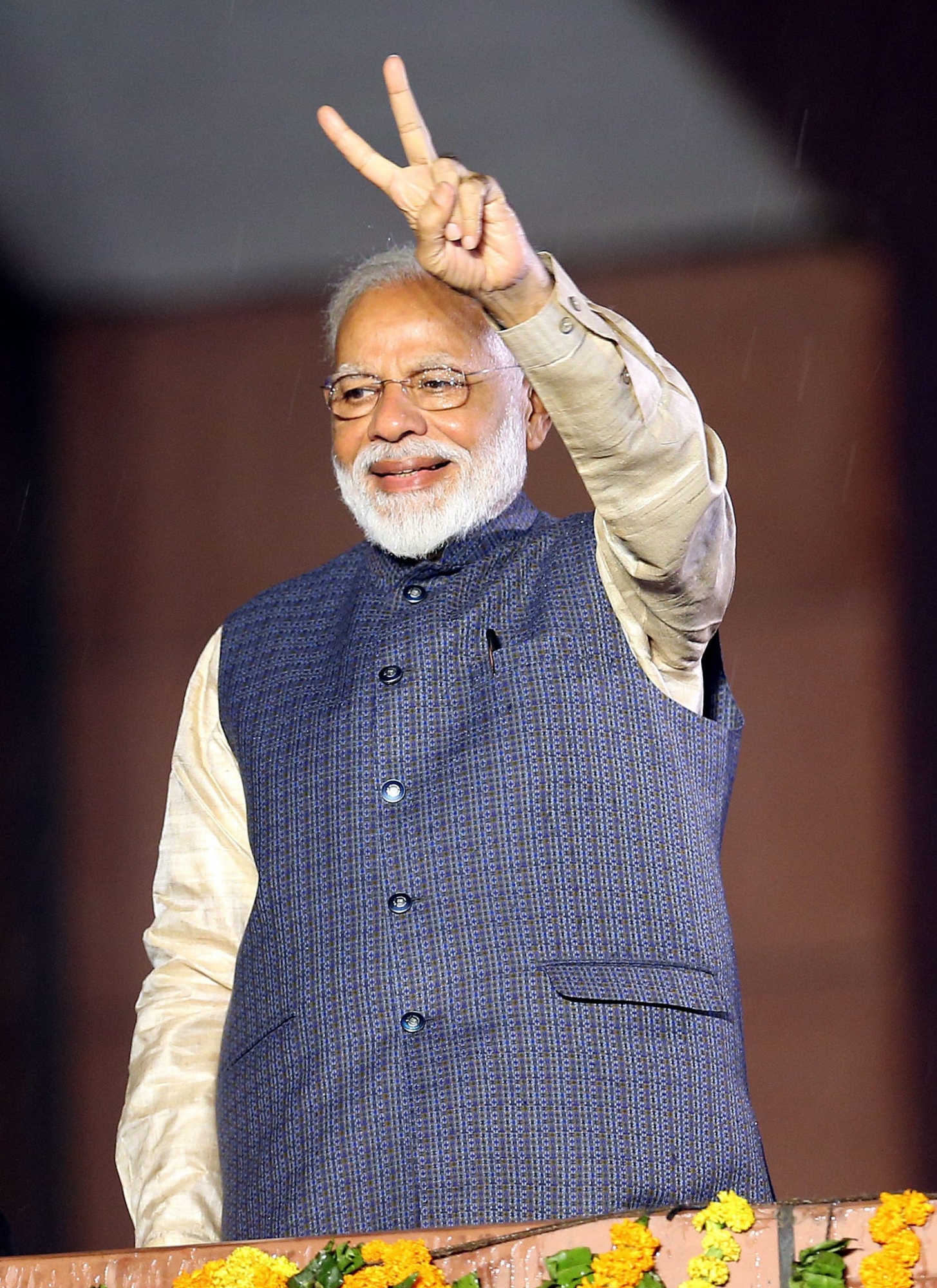 epa07594565  Bhartya Janta Party (BJP) leader and Indian Prime Minister Narendra Modi gestures a victory sign at the party headquarters in New Delhi, India, 23 May 2019. The Lok Sabha, the lower house of Parliament, elections, which began on 11 April 2019, is having the results tallied on 23 May. The Lok Sabha elections were held for 542 of the 543 lower house seats, and a party or alliance needs 272 seats to form a government. According to the polling Narendra Modi could retain the position of Prime Minister along with the Bhartya Janta Party (BJP).   EPA/HARISH TYAGI INDIA ELECTIONS