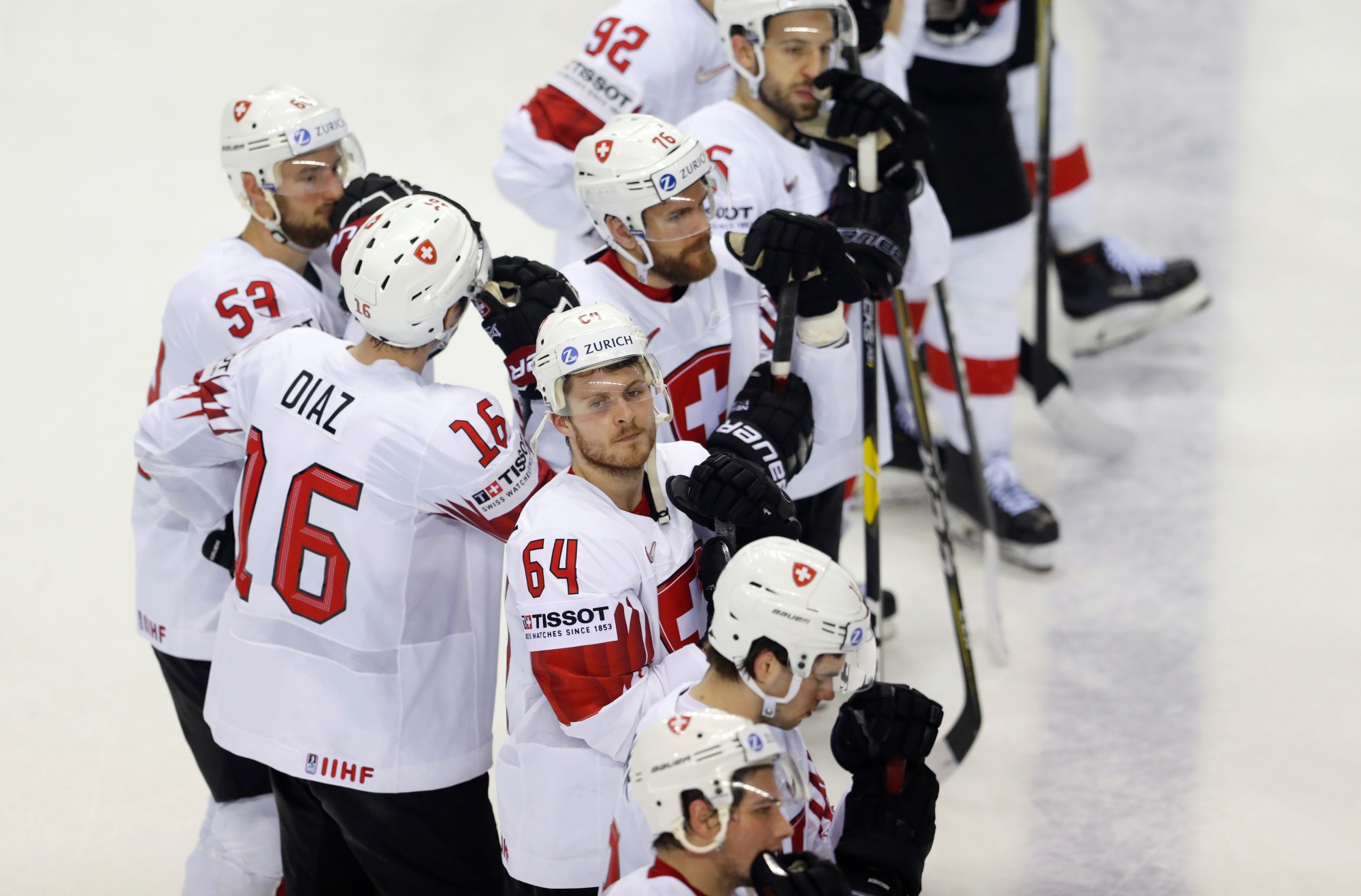 Switzerland players react at the end of the Ice Hockey World Championships quarterfinal match between Canada and Switzerland at the Steel Arena in Kosice, Slovakia, Thursday, May 23, 2019. Canada won 3-2. (AP Photo/Petr David Josek) Slovakia Ice Hockey Worlds