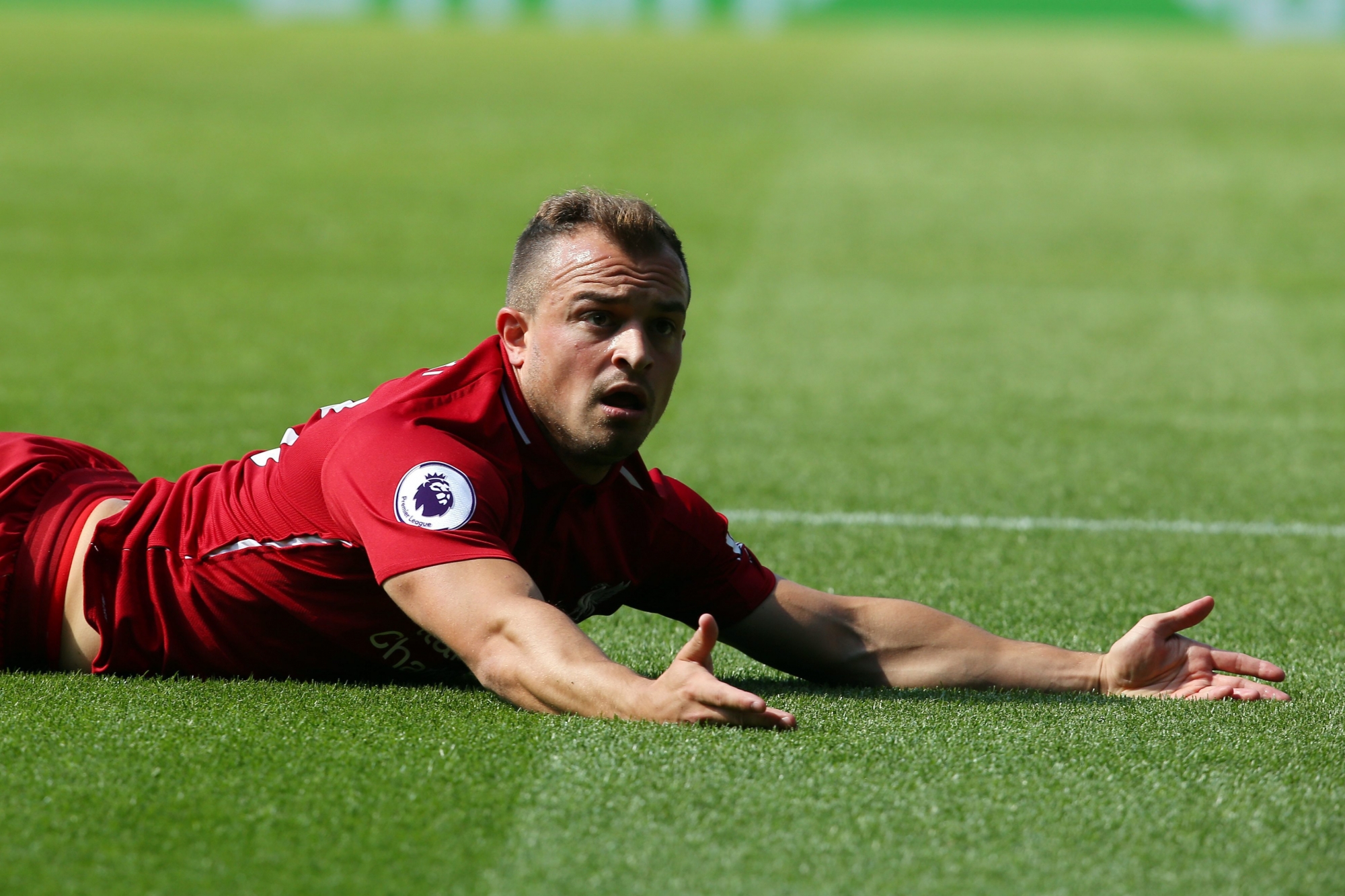 epa06989721 Liverpool's Xherdan Shaqiri reacts during the English Premier League soccer match between Leicester City and Liverpool FC at the King Power Stadium in Leicester, Britain, 01 September 2018.  EPA/TIM KEETON EDITORIAL USE ONLY. No use with unauthorized audio, video, data, fixture lists, club/league logos or 'live' services. Online in-match use limited to 120 images, no video emulation. No use in betting, games or single club/league/player publications. BRITAIN SOCCER ENGLISH PREMIER LEAGUE