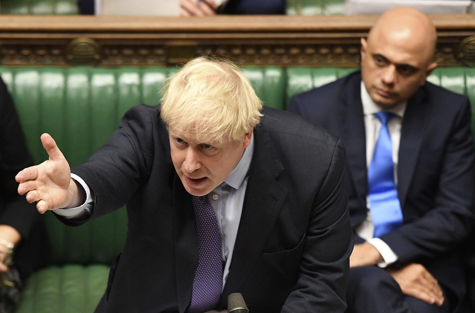 Britain's Prime Minister Boris Johnson gestures as he speaks in the House of Commons in London during the debate for the EU Withdrawal Agreement Bill, Tuesday Oct. 22, 2019. British lawmakers have rejected the governmentÄôs fast-track attempt to pass its Brexit bill within days, demanding more time to scrutinize the complex legislation and throwing Prime Minister Boris JohnsonÄôs exit timetable into chaos. (Jessica Taylor, UK Parliament via AP) APTOPIX Britain Brexit