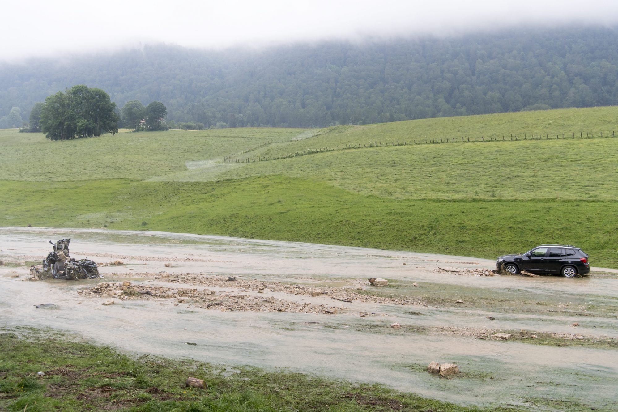 Les inondations qui ont frappé l'est du Val-de-Ruz, le 21 juin dernier, ont fait un décès et ont obligé de nombreux habitants à quitter leur domicile.
