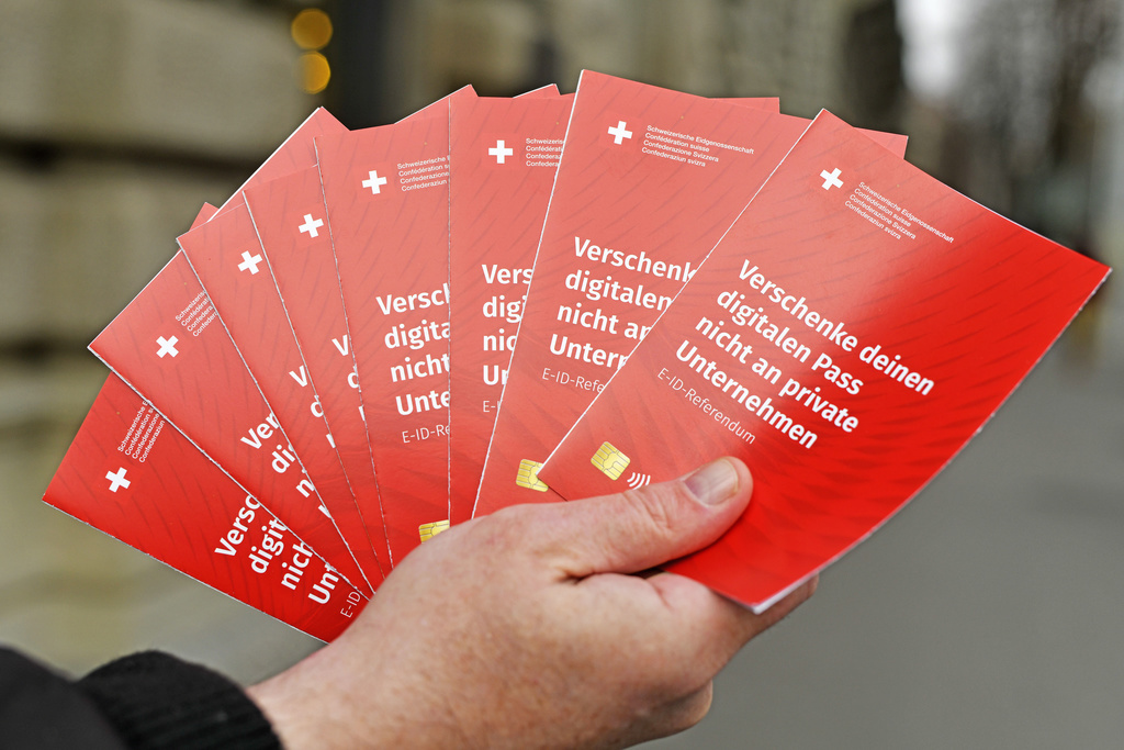 Campagne contre le passeport suisse numérique (E-ID) et collecte de signatures à Zurich, le 5 décembre dernier.
