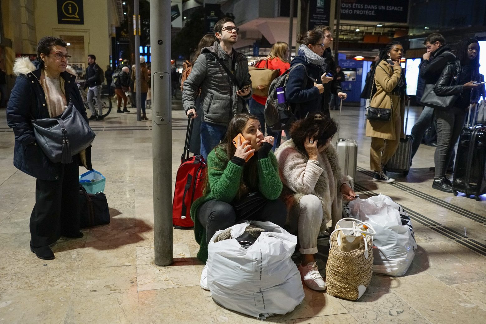 Travellers look at information screens detailing service disruptions at the Gare St-Charles station in Marseille, southern France, as services begin to wind-down Wednesday, Dec. 4, 2019. France is getting ready for massive, nationwide strikes from Thursday against government plans to overhaul the state pension system that will disrupt trains, buses and flights and force many schools to close.AP Photo/Daniel Cole)
France readies for massive transport strike Thursday EU France Strikes