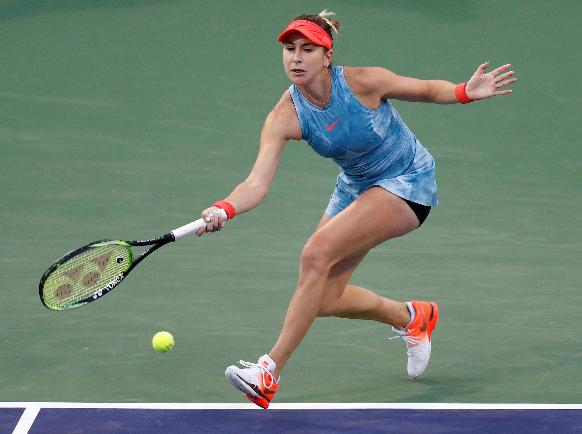 epa07432768 Belinda Bencic of Switzerland in action against Naomi Osaka of Japan during the BNP Paribas Open tennis tournament at the Indian Wells Tennis Garden in Indian Wells, California, USA, 12 March 2019. The men's and women's final will be played, 17 March 2019.  EPA/JOHN G. MABANGLO USA TENNIS BNP PARIBAS OPEN