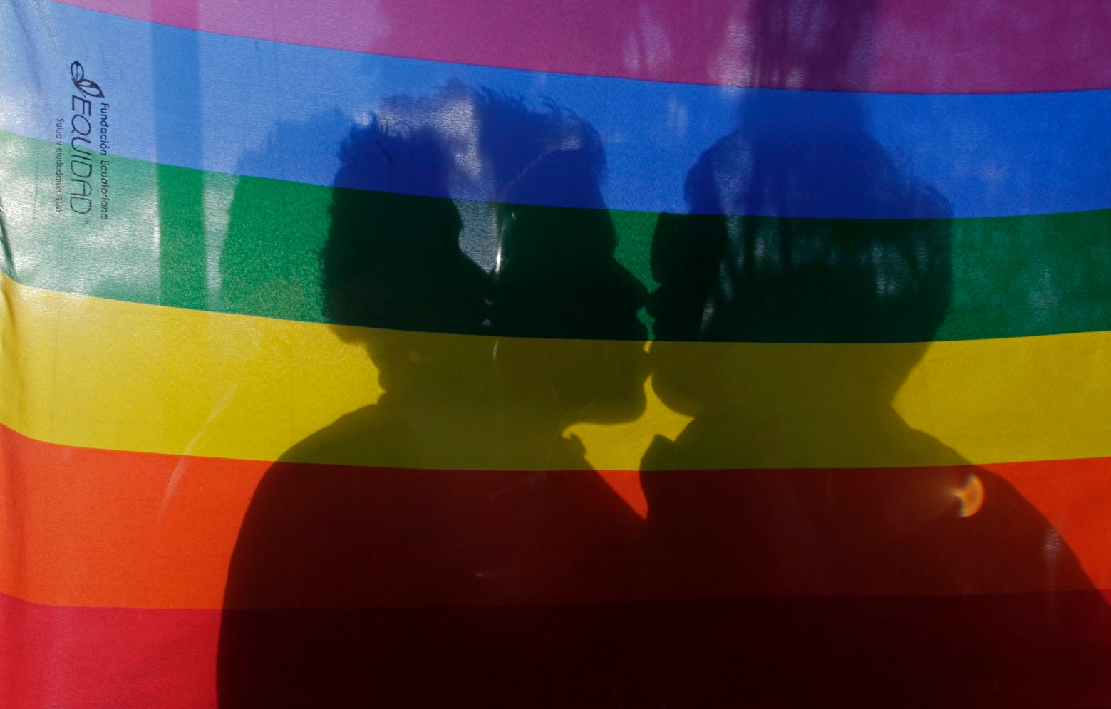 A gay couple kiss  during a march on International Day Against Homophobia at the Gabriela Mistral park in Quito, Ecuador, Thursday, May 17, 2012.(AP Photo/Dolores Ochoa) Ecuador International Day Against Homophobia