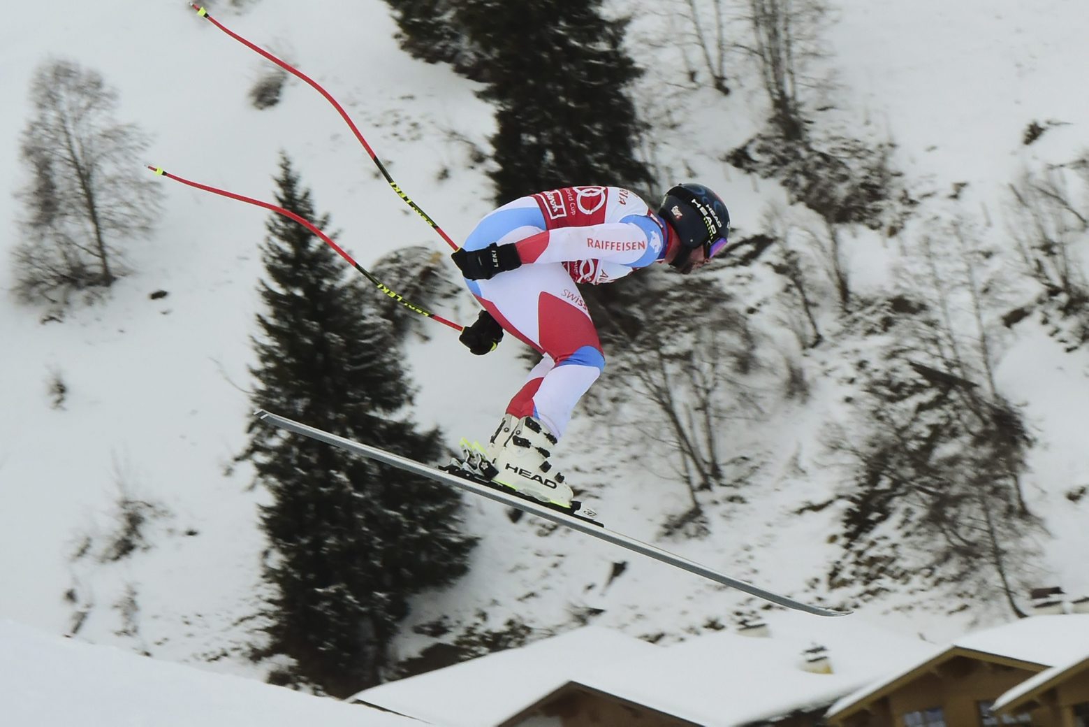 Switzerland's Beat Feuz speeds down the slope during training for an alpine ski, men's World Cup downhill, in Saalbach, Austria, Wednesday, Feb. 12, 2020. (AP Photo/Pier Marco Tacca) Austria Alpine Skiing World Cup