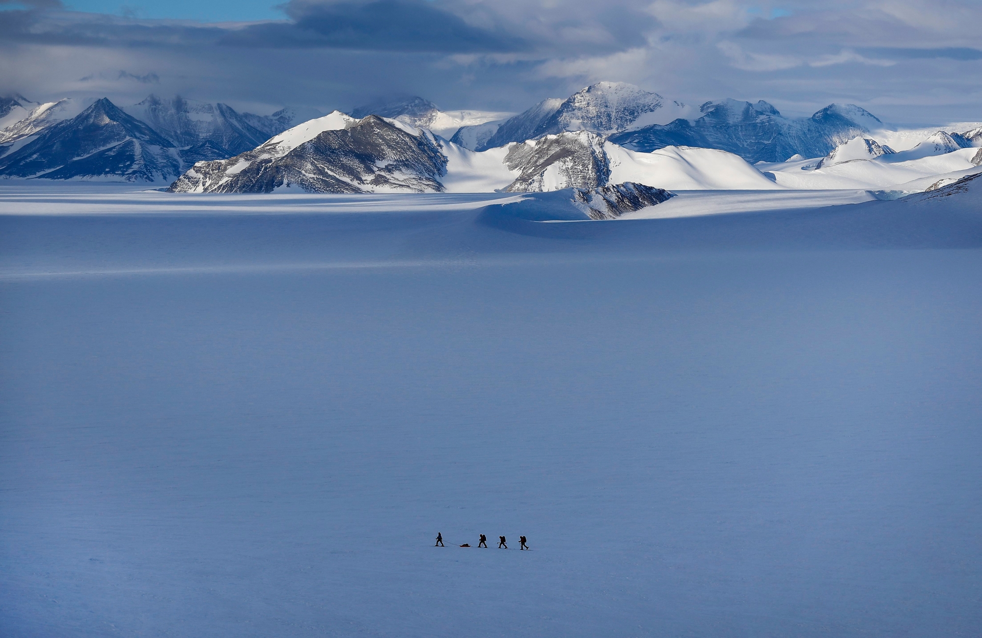epaselect epa07239648 (19/29) Chilean scientist Ricardo Jana (L) and a group of military explorers track an area with GPS near the Higgins Nunatak, on the Union Glacier in the Ellsworth Mountains, Antarctica, 29 November 2018. A group of eight researchers take part in the first activity of the LV Scientific Antarctic Expedition organized by the Chilean Antarctic Institute (INACH). The Glacier Union camp is a Chilean polar station operated by the three groups of the Armed Forces of Chile and the INACH, and marks the beginning of all scientific activities planned in the Antarctic territory for the summer season. Glacier Union is the third most southern camp of the continent and it is only open for a month.  EPA/FELIPE TRUEBA  ATTENTION: For the full PHOTO ESSAY text please see Advisory Notice epa07239629 epaselect ANTARCTICA PHOTO ESSAY SCIENTIFIC EXPLORATION