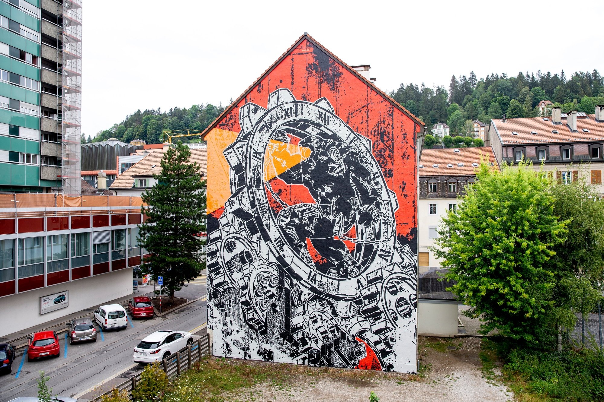 Impossible d'échapper au cours du temps, dit cette fresque intitulée "Les esclaves du temps", de M-City, au Locle.